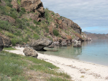 Beach and cliffs of Isla Coyote