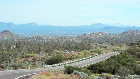 view of the mountains and desert plain from top of Portezuelos grade