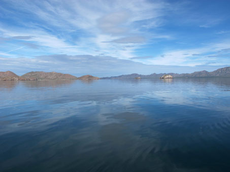 Reflections in mirrorlike bay waters